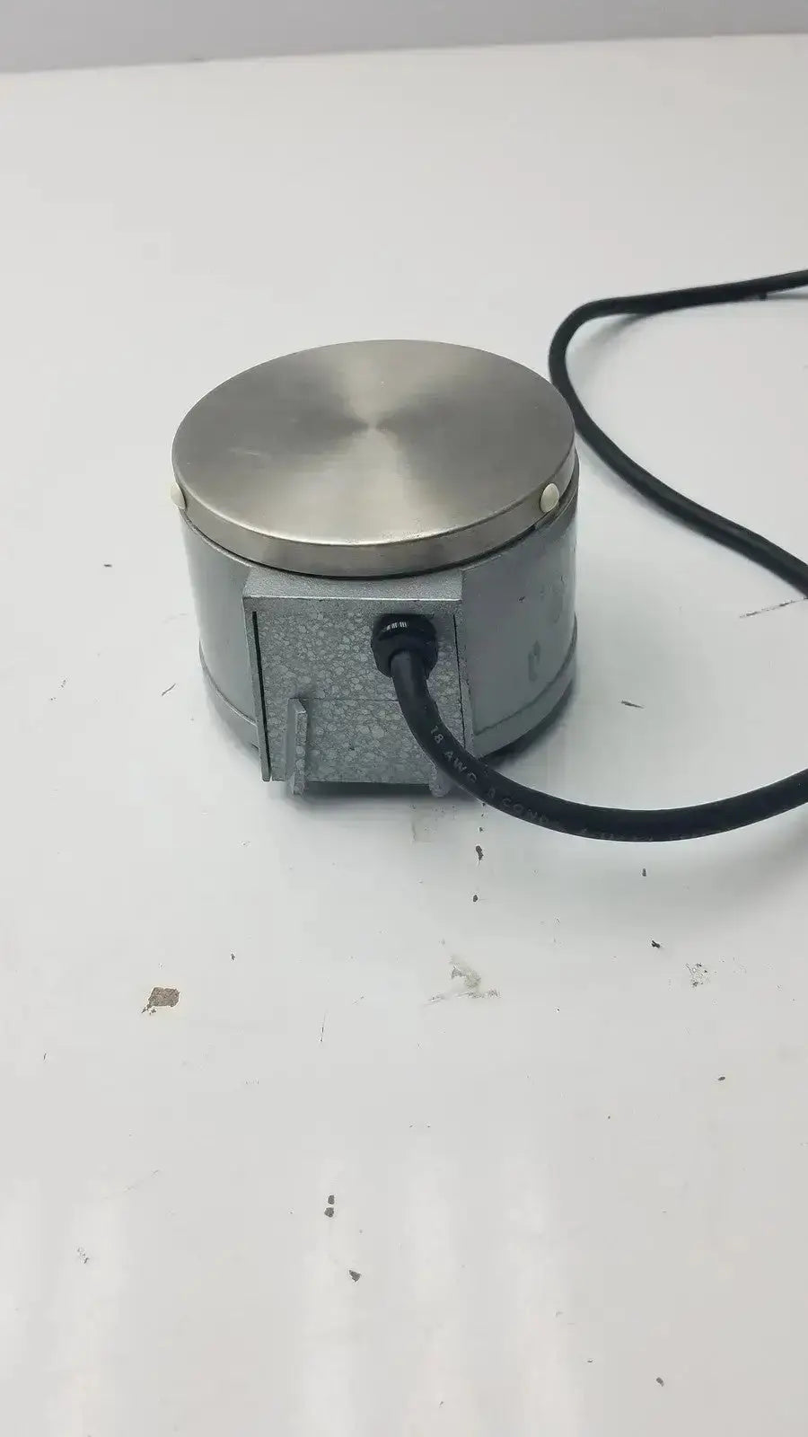 Gray cylindrical precision scientific mag-mix 60647 with brushed stainless steel top and black power cord