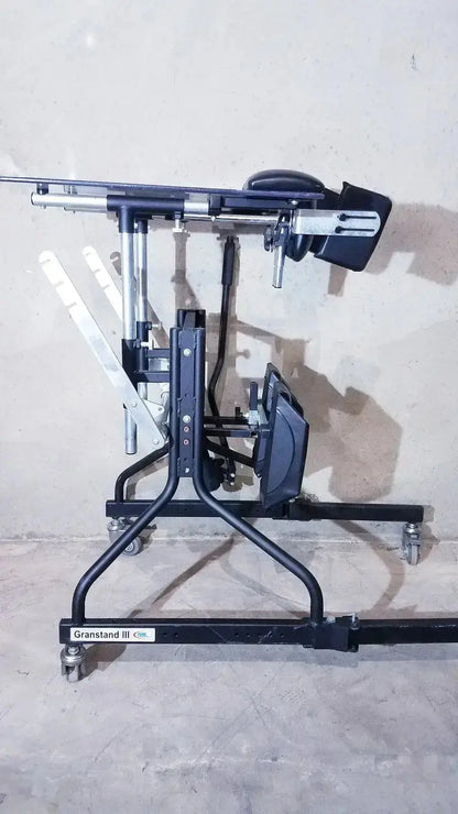 Black metal grandstand iii modular standing system with adjustable components and caster wheels for mobility
