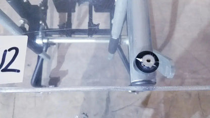 Silver metallic bicycle stand with black rubber grip and circular knob in prime engineering grandstand iii modular standing system