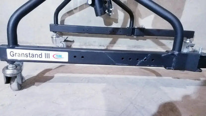 Black metal trailer hitch with wheels and grandstand iii label for prime engineering grandstand iii modular standing system