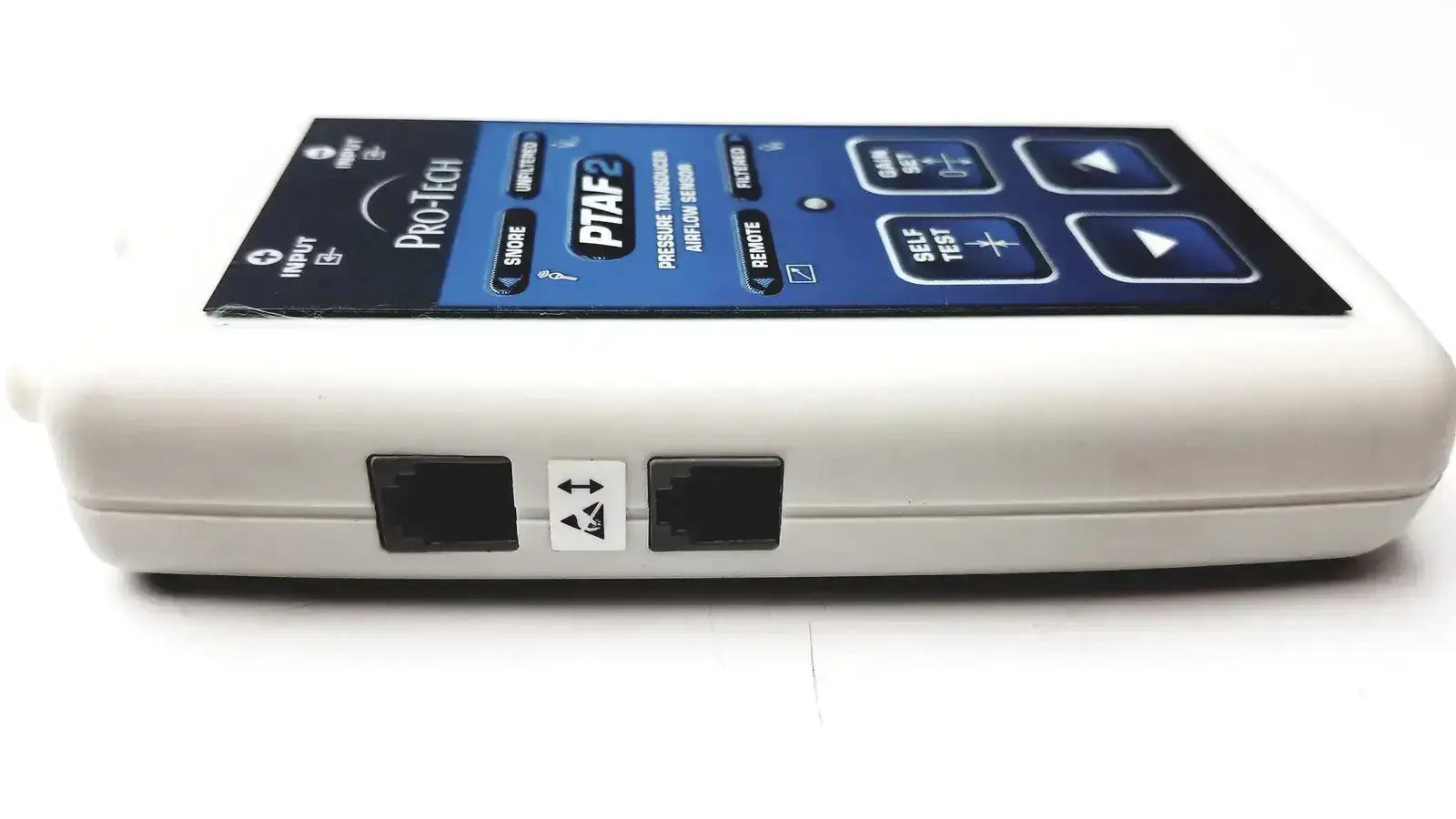 White plastic ptaf2 pressure transducer airflow sensor with blue control panel and black ports for airflow monitoring