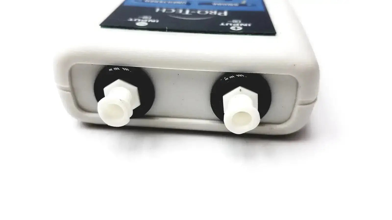 White plastic pro-tech ptaf2 pressure transducer airflow sensor with two black ports and white connectors backside view