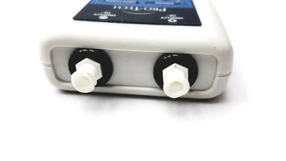 White plastic pro-tech ptaf2 pressure transducer airflow sensor with two black ports and white connectors backside view