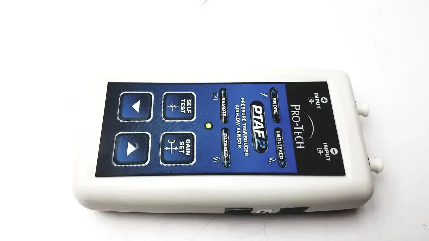 White plastic pro-tech ptaf2 pressure transducer airflow sensor with blue control panel and labeled buttons and ports
