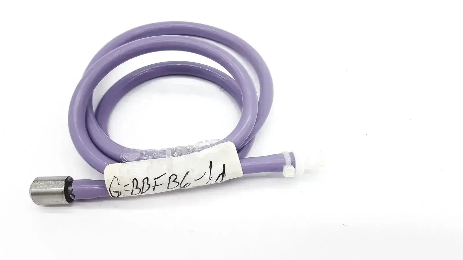Purple color pressure water mini pipe coiled with one side metal connector and white label for pressure water use