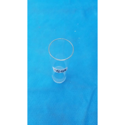 Clear glass test tube with a white label bearing black text.