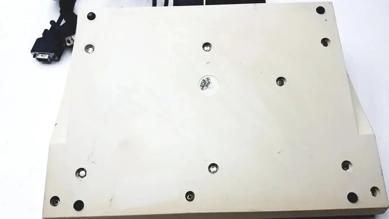 Beige plastic dvd drive with multiple screw holes and small sticker on back side of radiometer copenhagen tim900 titration manager