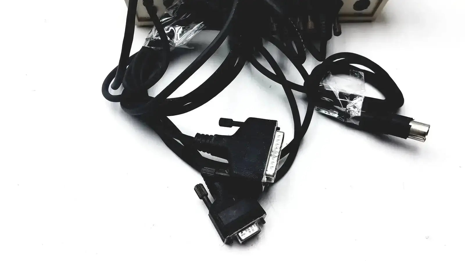 Black coiled cables with dvi and vga connectors on the back of radiometer copenhagen tim900 titration manager