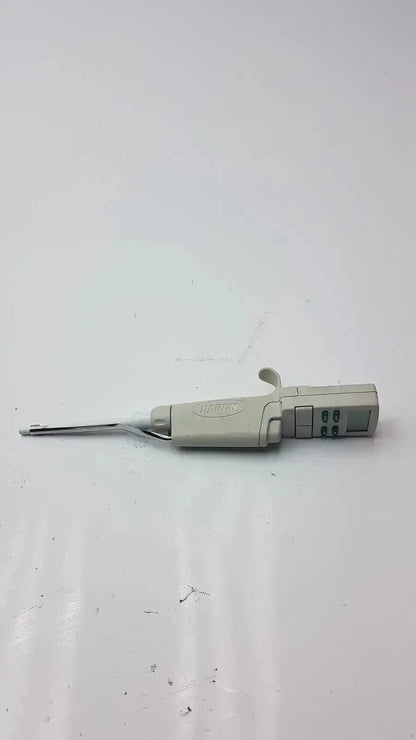 Beige rainin edp3 plus electronic digital pipette calibrated with metallic tip and digital display for precise liquid handling