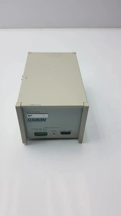 Beige rainin hplc pressure module 8700 psi with rectangular metal casing and front panel ports model g-bbda5-28r