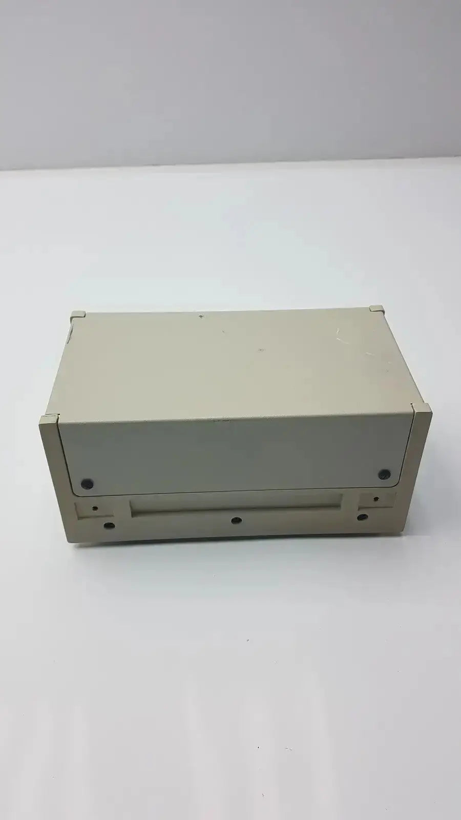 Beige rectangular rainin hplc pressure module 8700 psi with front slot and four visible black screws g-bbda5-28r