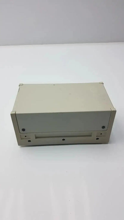Beige rectangular rainin hplc pressure module 8700 psi with front slot and four visible black screws g-bbda5-28r