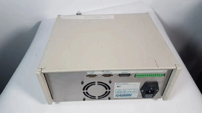 Beige metal industrial power supply unit with multiple serial ports and green terminal strip for rainin hpxl solvent delivery system