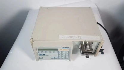 Beige rectangular rainin HPXL solvent delivery system with digital display keypad and metallic sample port for solvent delivery