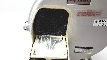 Gray metal ray foster mt12 dental lab model trimmer with black interior and white grinding surface for precise trimming