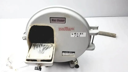 Gray ray foster model 6210-84 meat slicer with circular housing and front slicing compartment in ray foster mt12 dental lab model trimmer