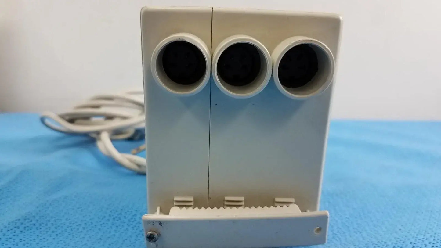 White plastic raydow rd-b-24 multi-function control box with three circular openings for reuse medical equipment use