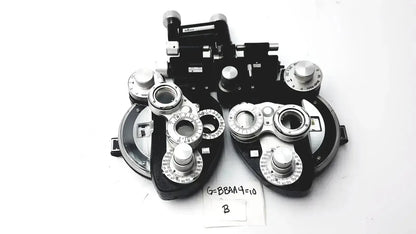 Black and silver Reichert 11625 minus cylinder phoropter refracting instrument with multiple dials and some damage