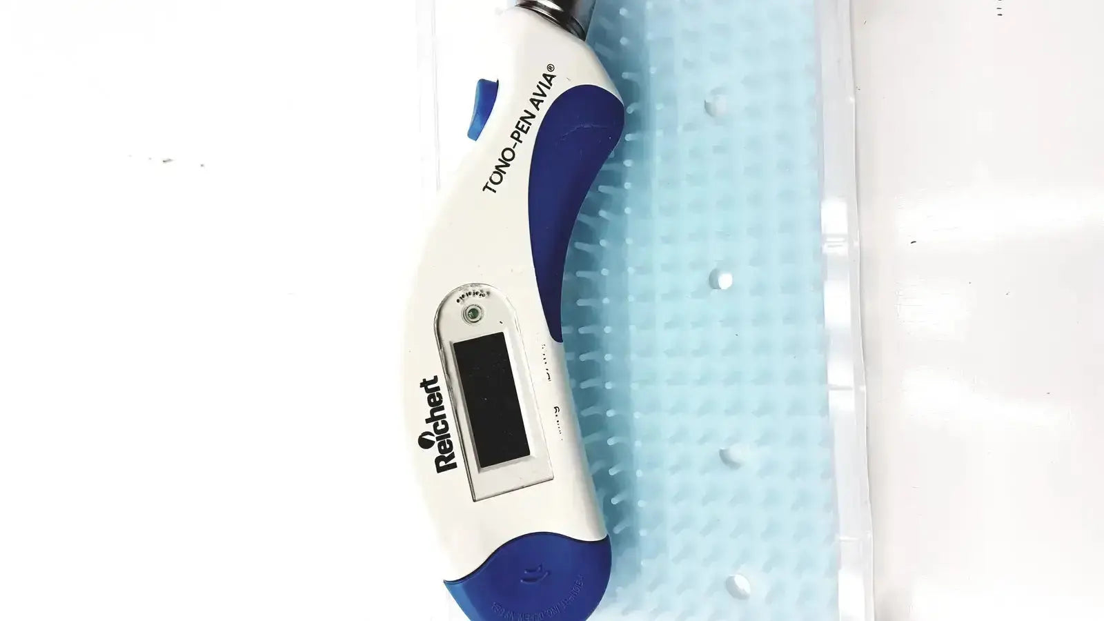 A white and blue digital thermometer with a sleek ergonomic design from the reichert avia tono-pen tonometer series