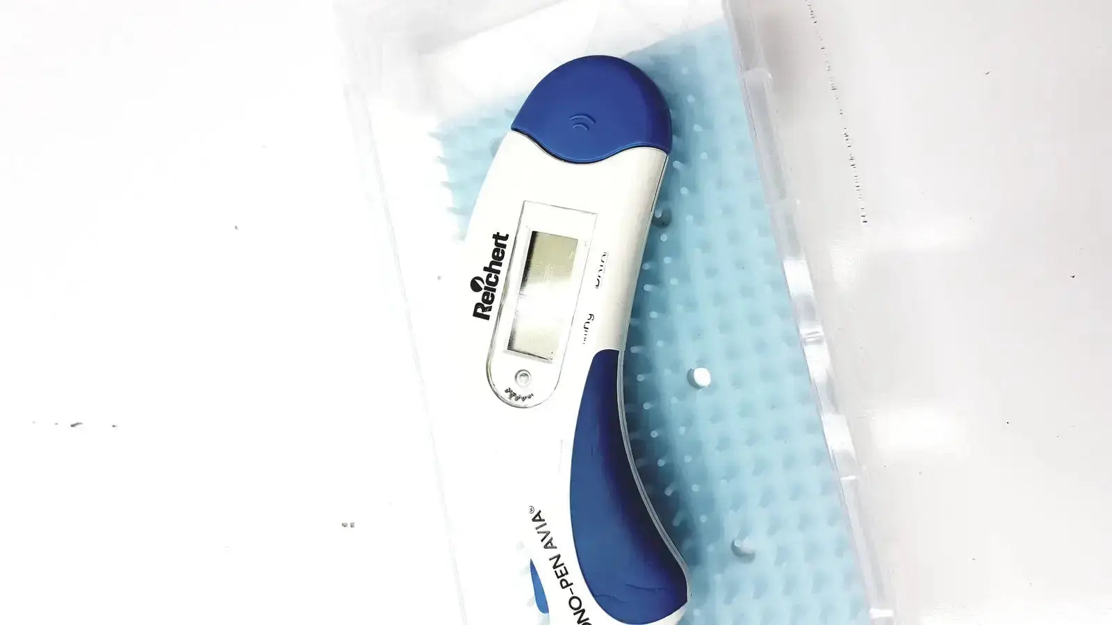 Blue and white digital thermometer with sleek ergonomic design for accurate readings in Reichert Avia Tono-Pen tonometer