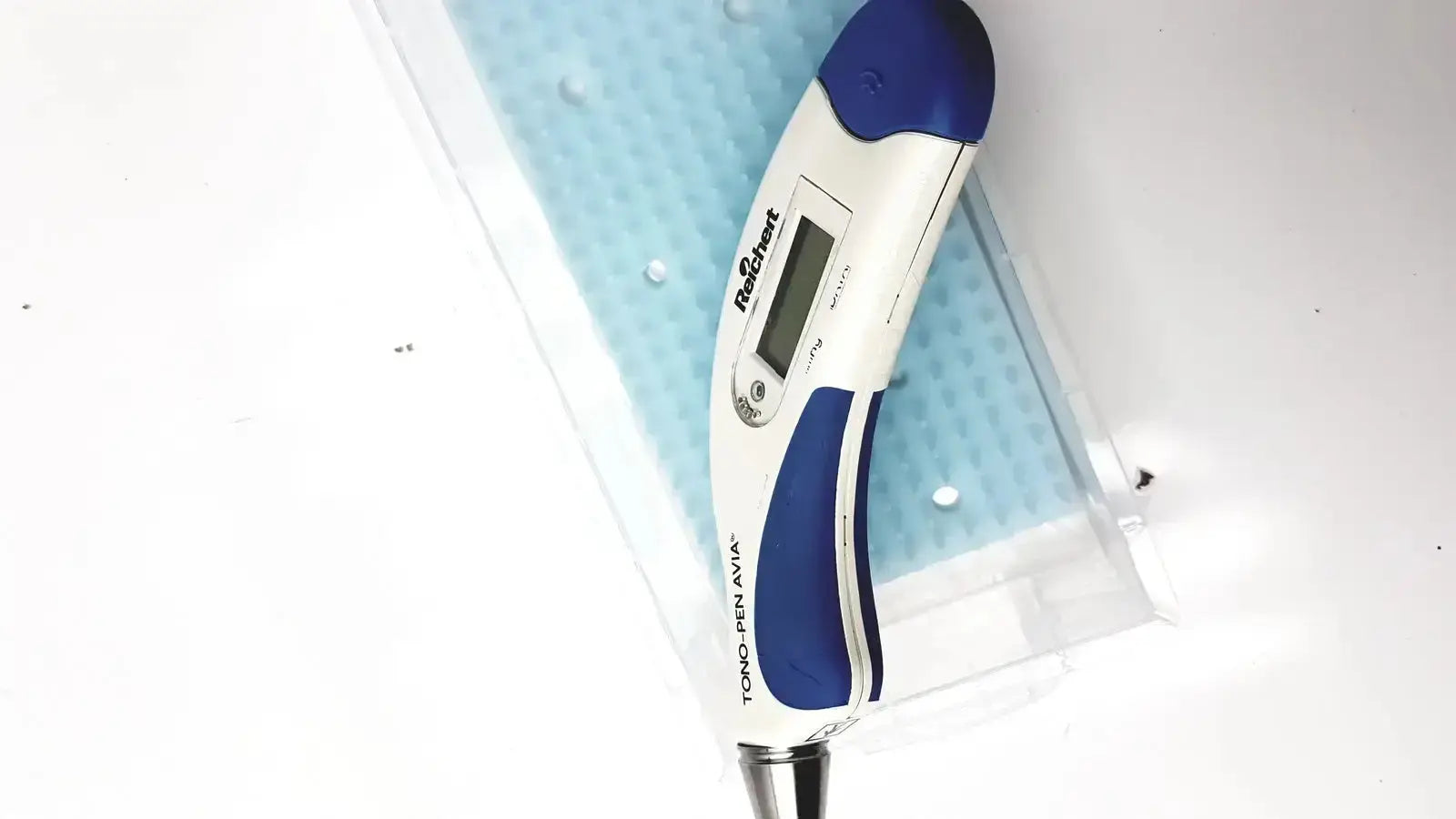 Blue and white digital thermometer with sleek ergonomic design in reichert avia tono-pen tonometer product