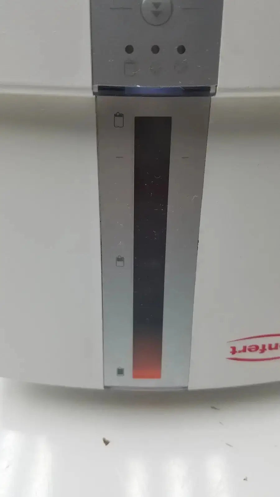 Silver metallic vertical slot on white renfert duomix ii automatic dental impression mixing machine with red branding