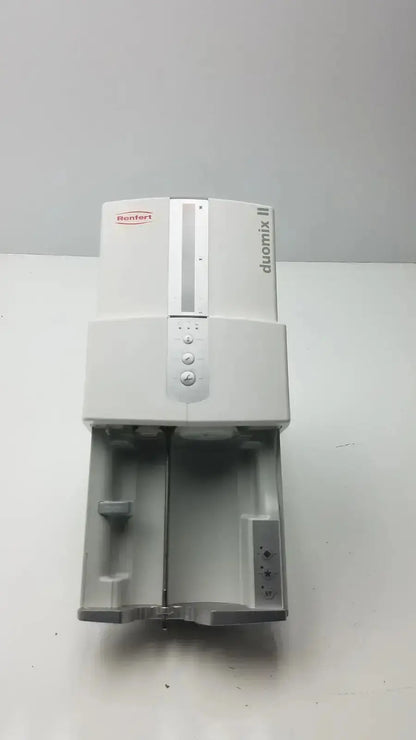 White and gray Renfert Duomix II automatic dental impression mixer with control buttons for dental impression mixing