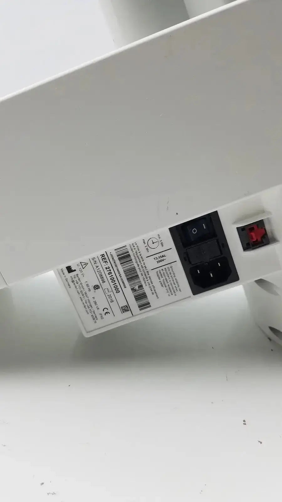 White rectangular power adapter with black input socket and red switch for renfert duomix ii automatic dental impression mixing
