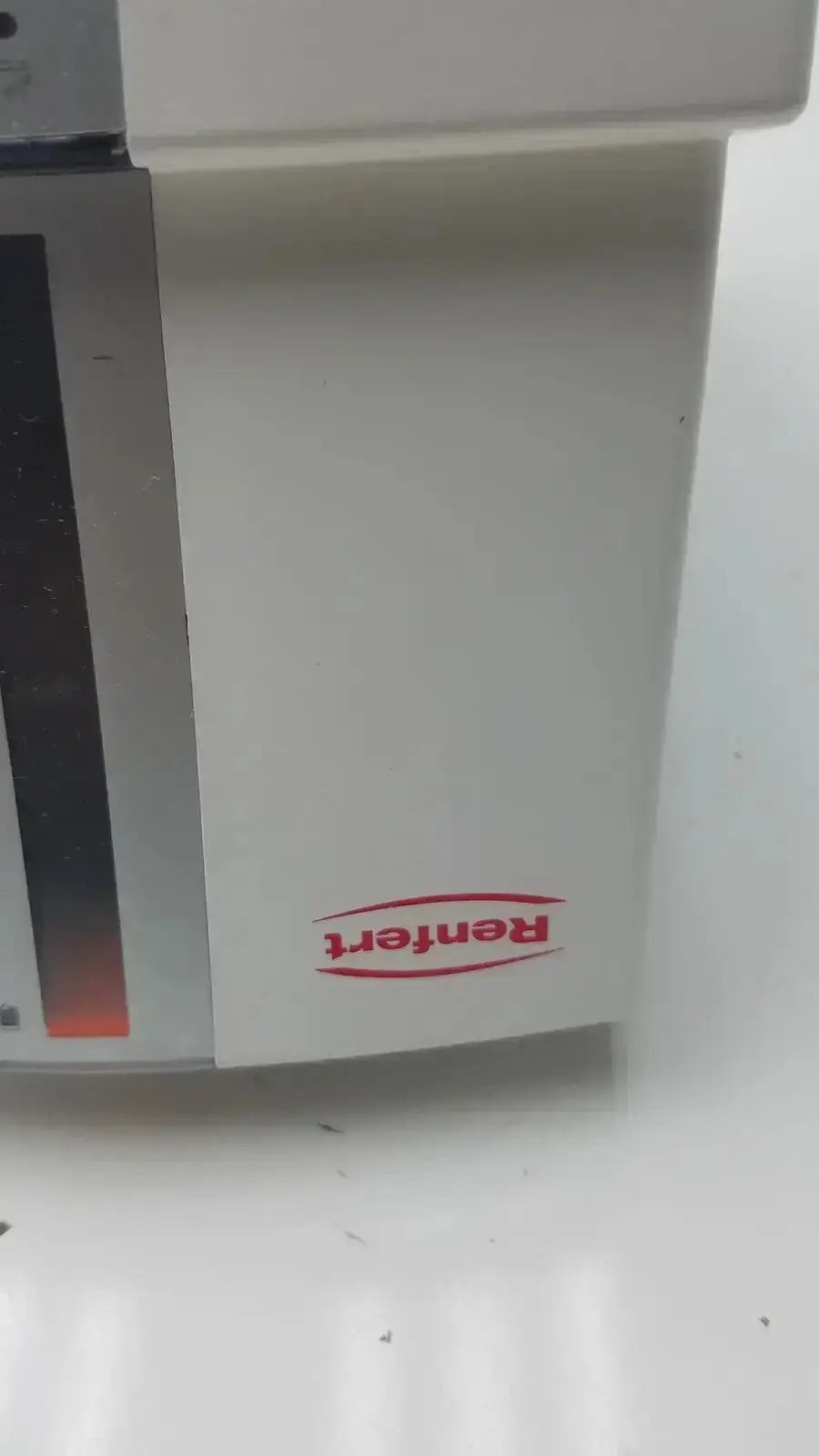 White renfert duomix ii automatic dental impression mixing appliance with sleek modern design and subtle red logo on side
