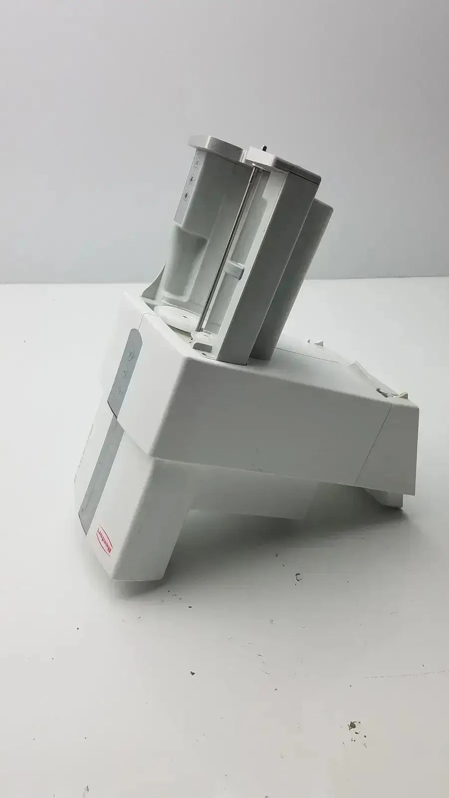 White plastic blender base with silver blade assembly for renfert duomix automatic dental impression mixing device