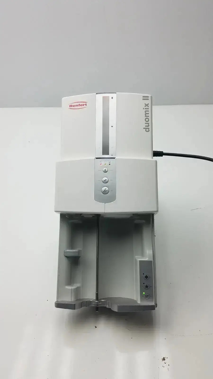 White and gray Renfert Duomix II automatic dental impression mixer with sleek design for dental impression mixing