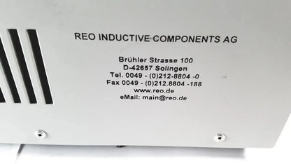 White metal reo reomed 600 iec/en60601-1 medical isolating transformer 3rd edition with black ventilation slits and contact info