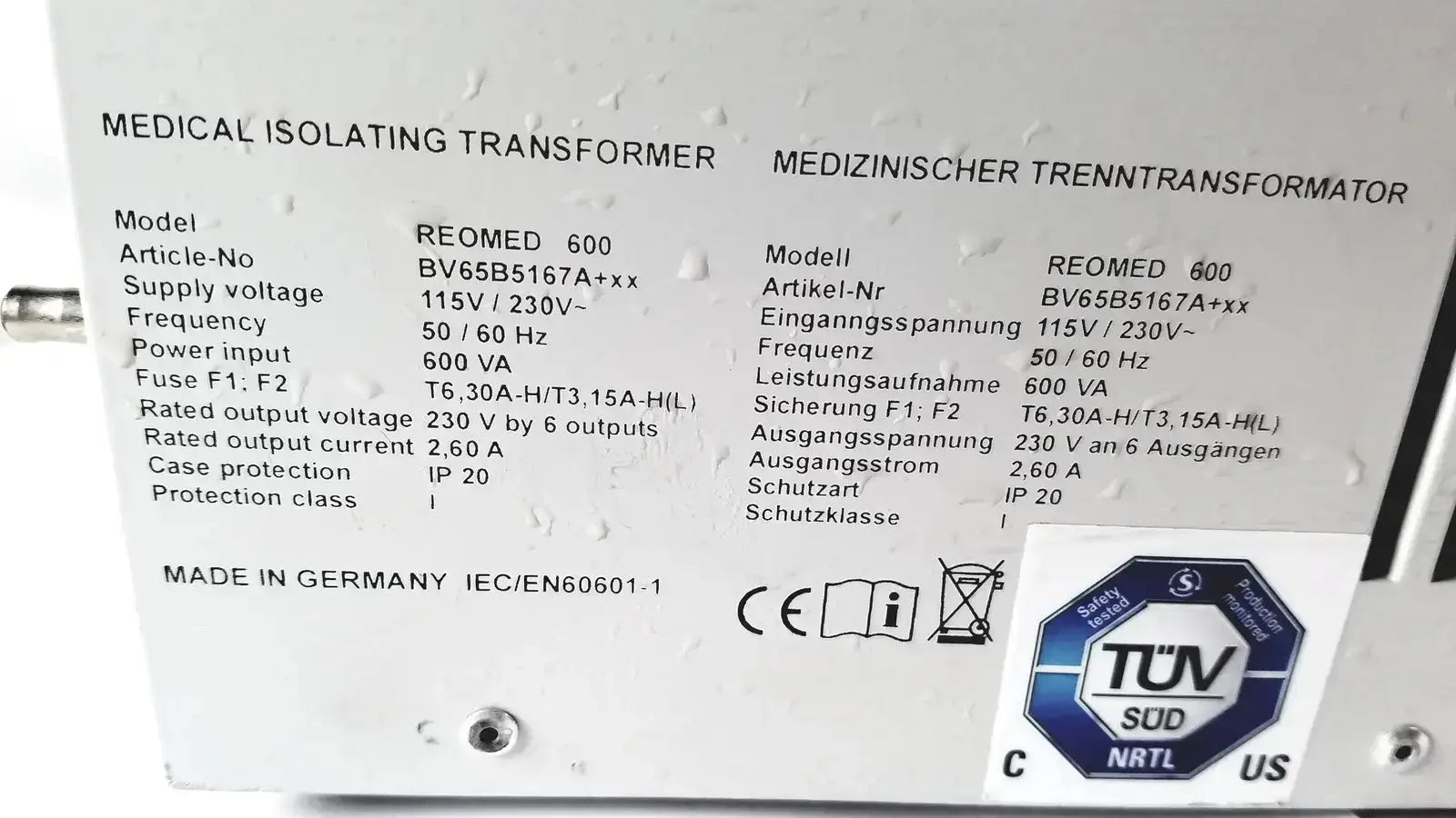 White label on the back side of reo reomed 600 3rd edition medical isolating transformer showing specifications and certifications