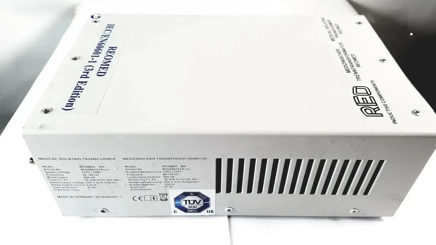 White rectangular reo reomed 600 iec/en60601-1 medical isolating transformer 3rd edition with black labels and ventilation slits