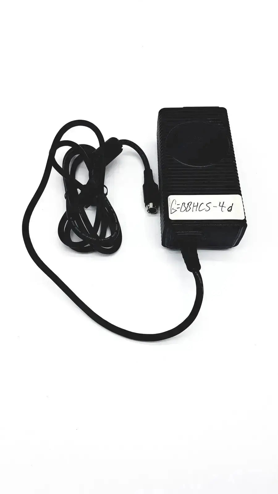 Black rectangular respironics power charger with coiled cable and white label bearing code g-88hcs-4d