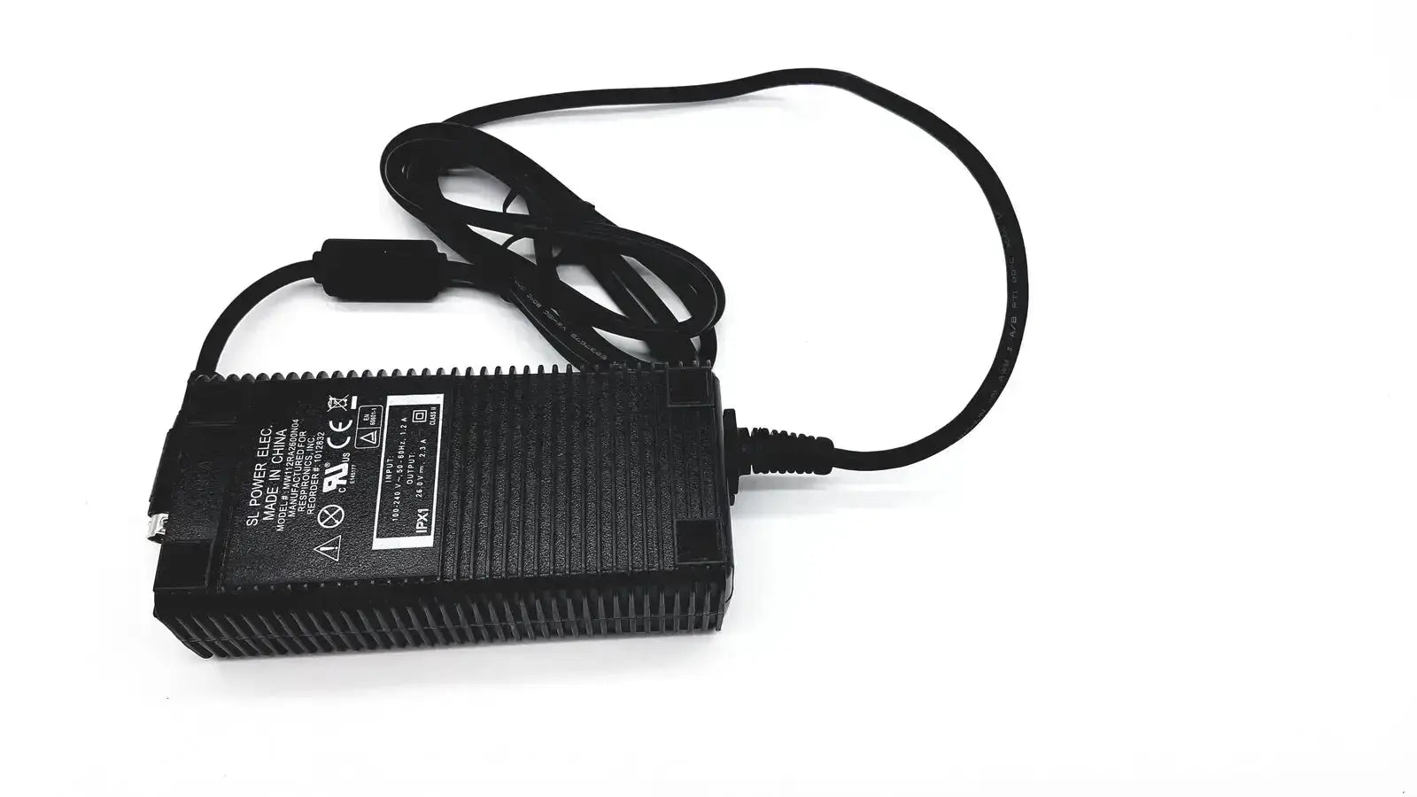 Black plastic respironics power charger with coiled cable and ribbed texture for reliable power delivery