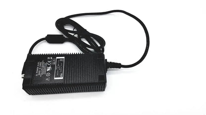 Black plastic respironics power charger with coiled cable and ribbed texture for reliable power delivery