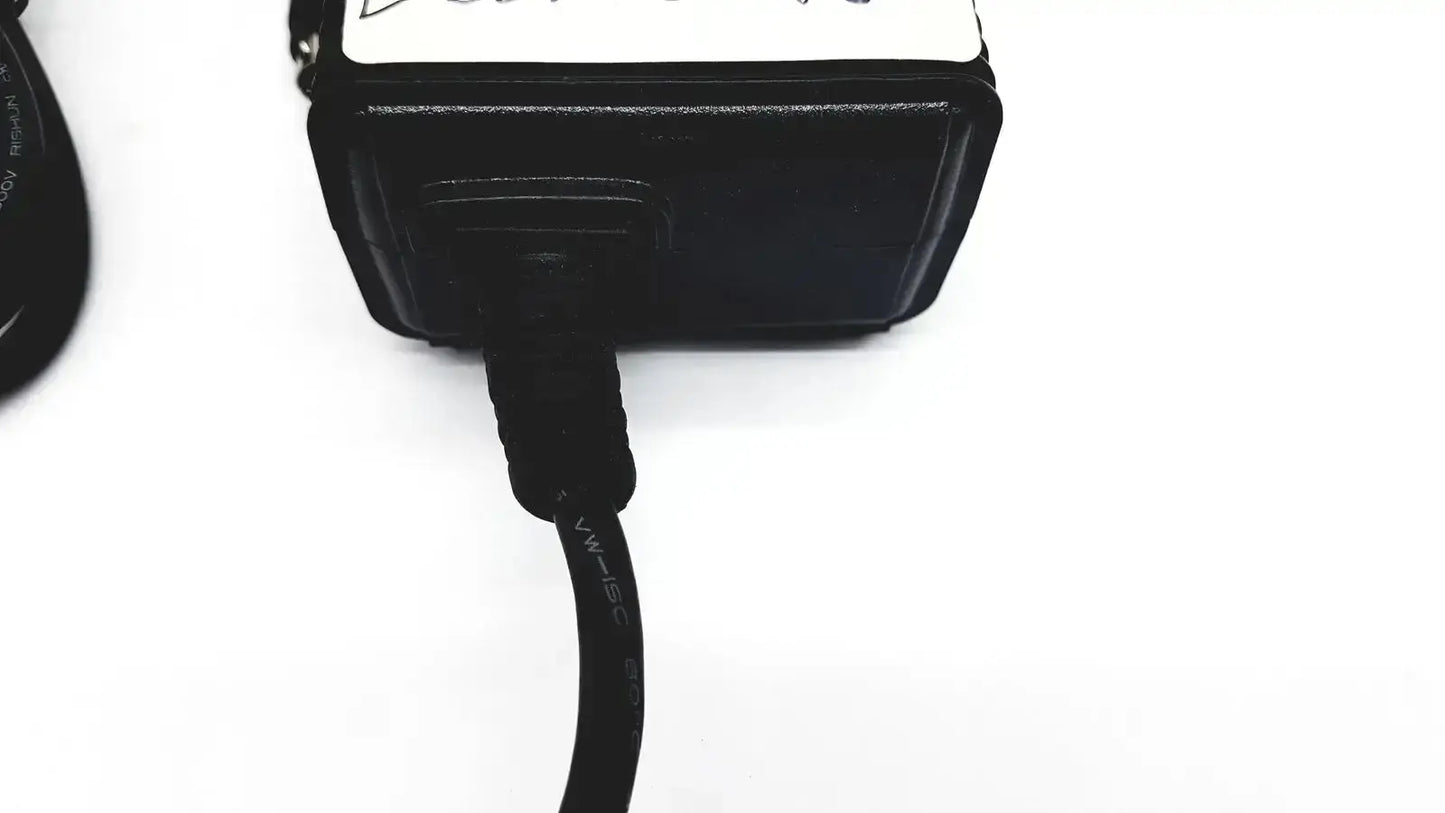 Black plastic respironics power charger with coiled usb cable for efficient device charging and power supply