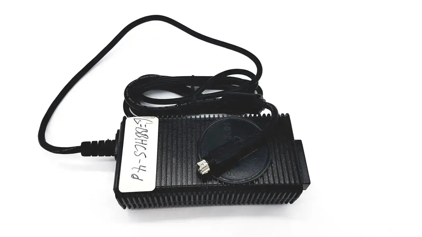 Black plastic respironics power charger with ribbed texture and coiled cable for reliable power connection