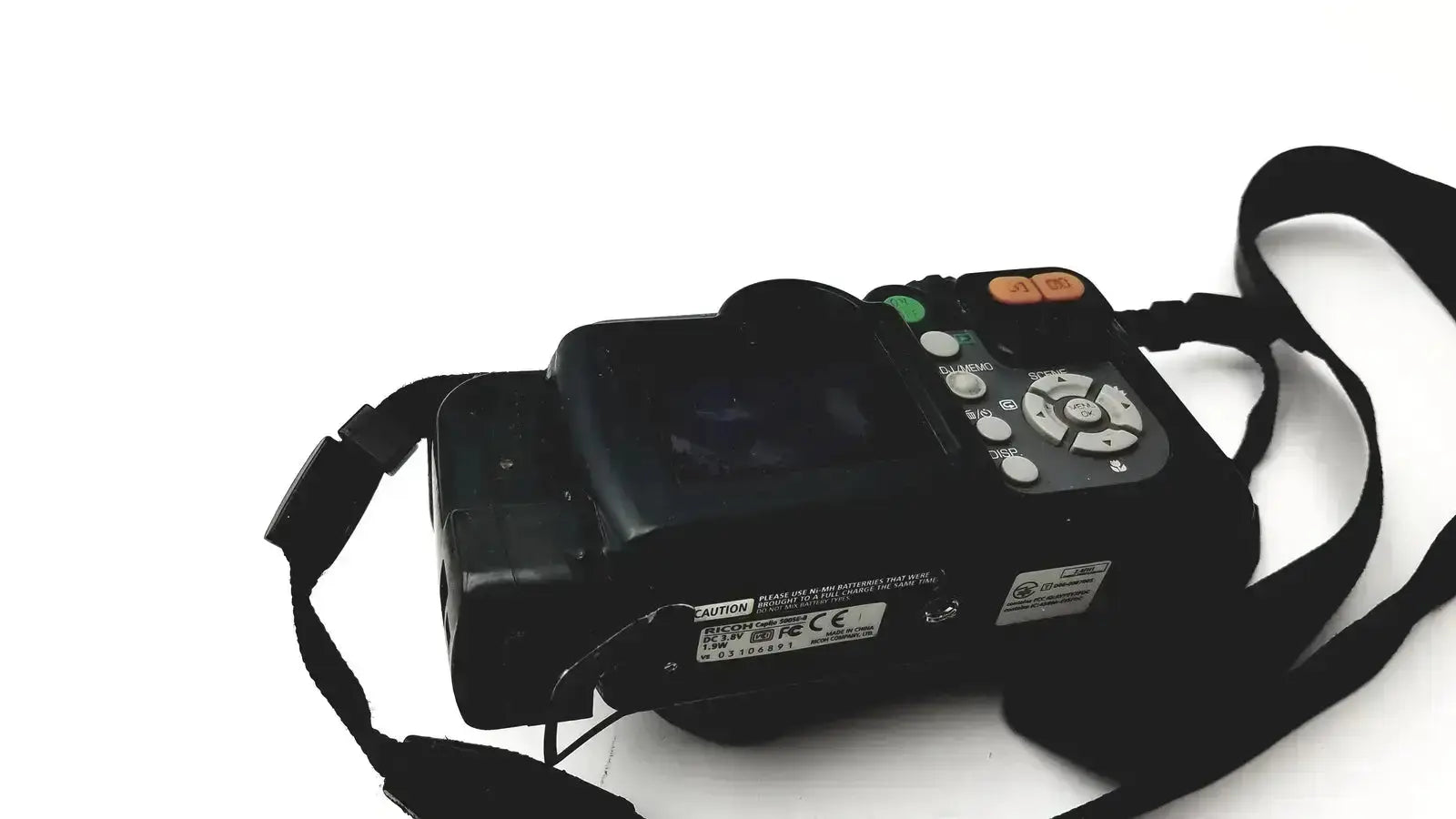 Black ricoh caplio 500se digital camera with 8 megapixels and 3x optical zoom digital camera featuring control buttons and wrist strap