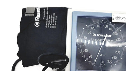 Blue-framed riester big ben square sphygmomanometer blood pressure monitor with black adult cuff and tubing