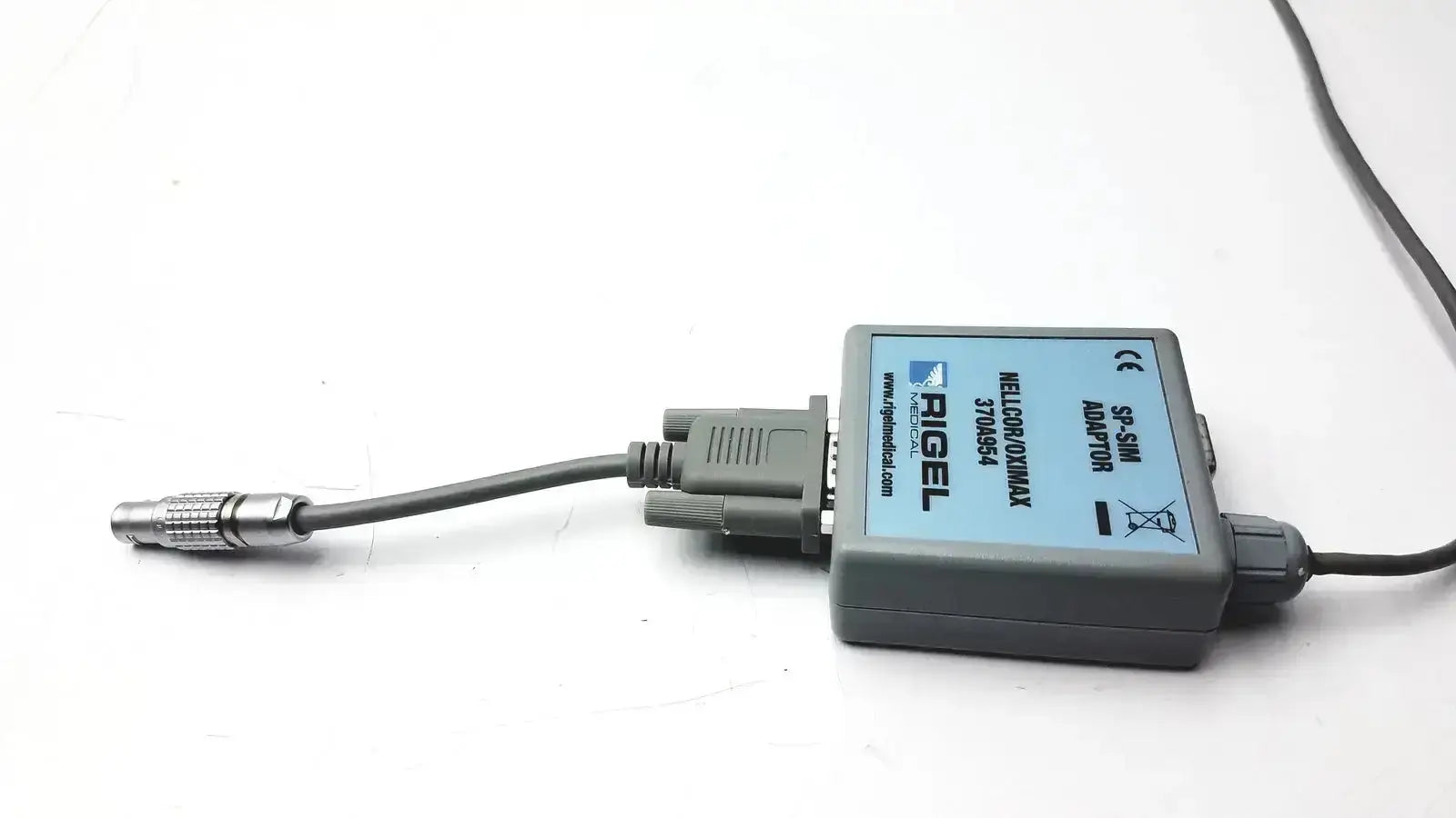 Gray rigel rs-232 to usb adapter nellcor oximax with blue label and multiple connectors for rigel medical use