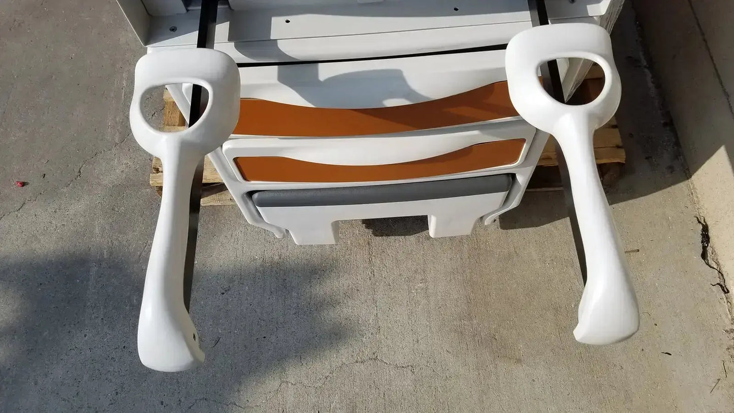 White plastic handrails with glossy finish and ergonomic curves on ritter by midmark exam table model 204-011 for pre owned medical equipment sale