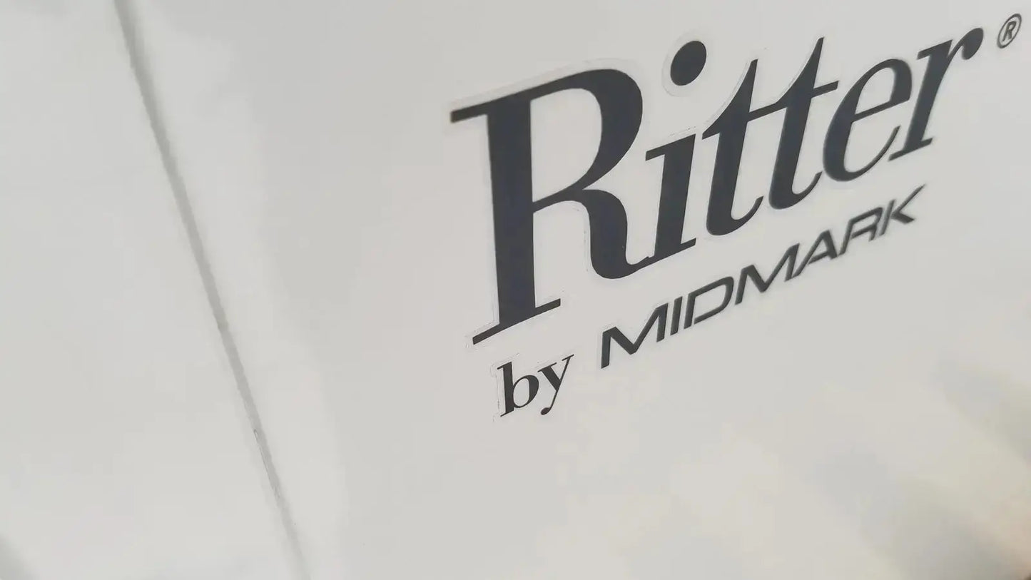 White Ritter by Midmark exam table label with black serif lettering for buy used medical equipment sale
