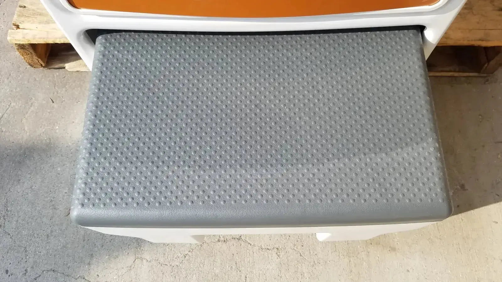 Gray textured plastic step with white frame on ritter by midmark exam table model 204-011 for buy used medical equipment