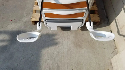 White plastic stroller with orange and gray accents and two side handles by midmark used medical equipment for sale