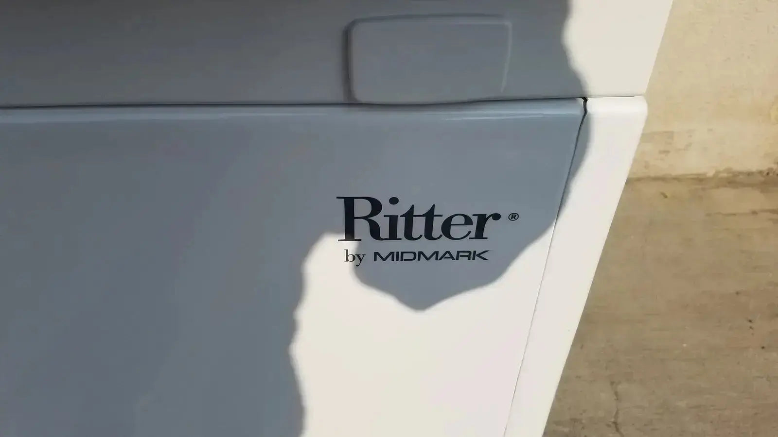 Gray ritter by midmark exam table model 204-011 with sleek modern design and smooth plastic finish for medical use