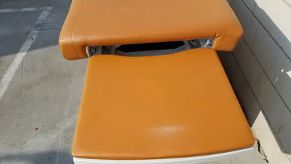 Ritter by midmark exam table model 204-011 orange upholstered exam table with padded surfaces for buy used medical equipment