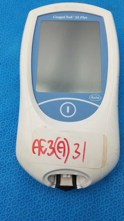 White and blue roche coaguchek xs plus blood coagulation analyzer with digital display medical equipment model 04562780001