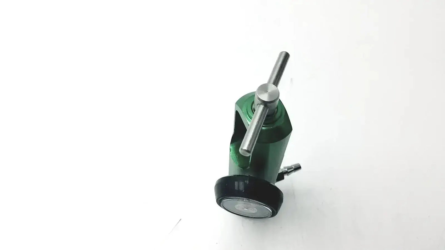 Green oxygen regulator with black base and silver knob by Roscoe Medical Mini for precise medical mini oxygen control